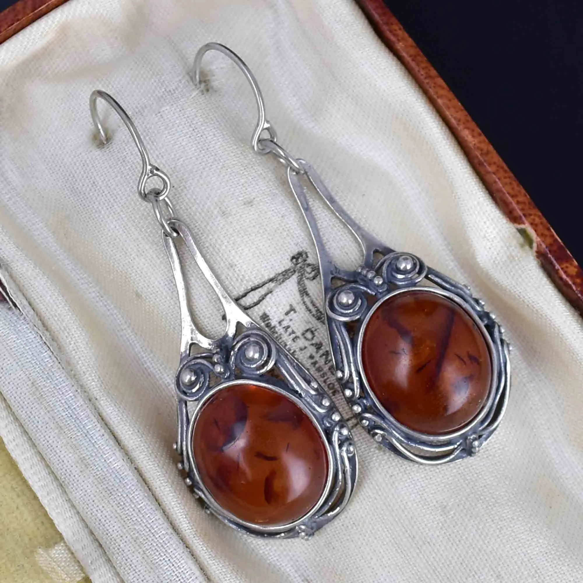 Arts and Crafts Style Silver Scroll Natural Amber Drop Earrings