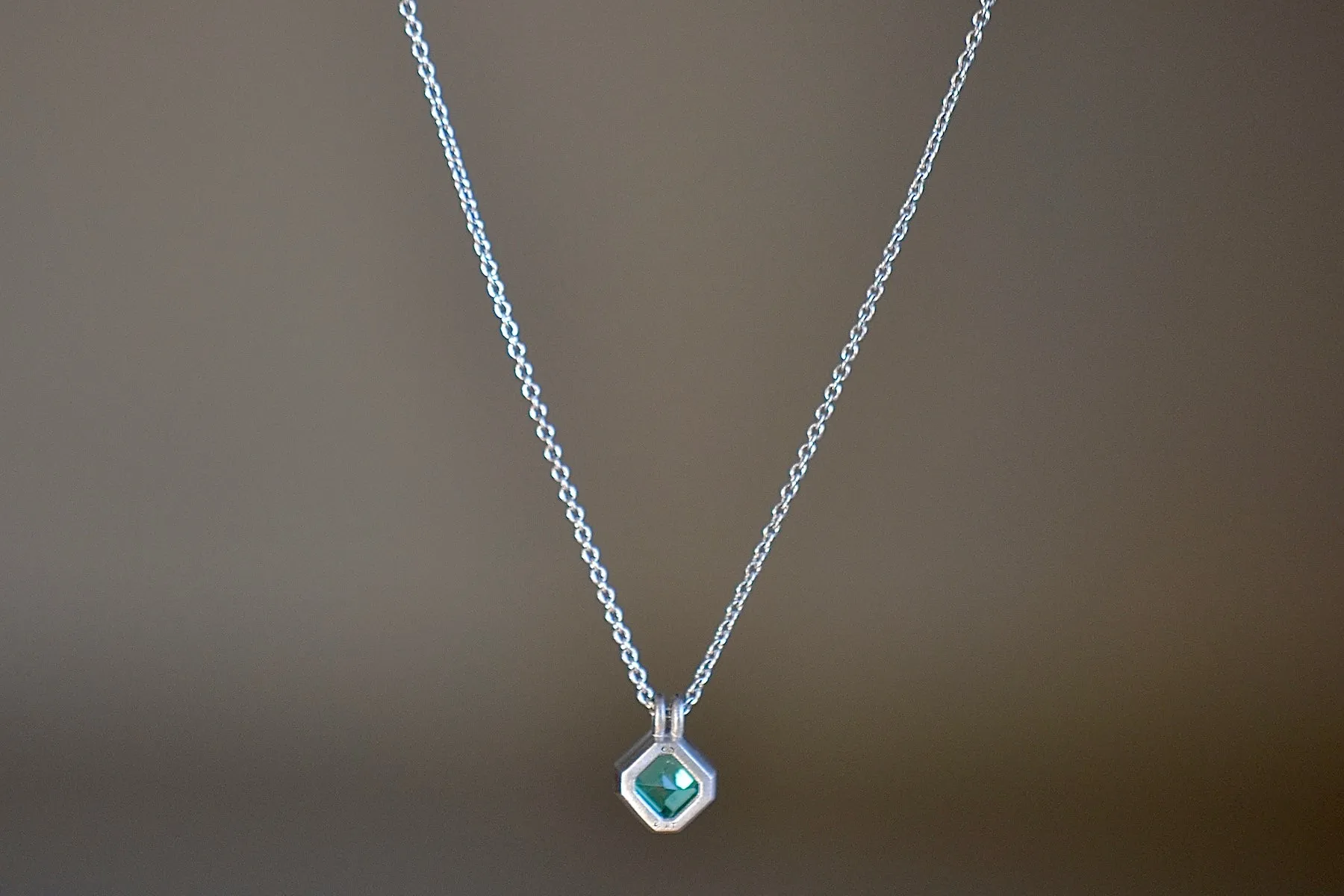 Duo Bale Emerald Pendant in Platinum