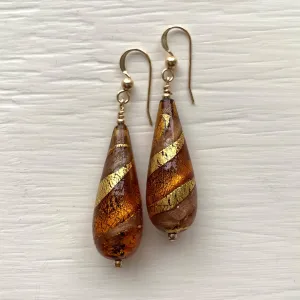 Earrings with brown topaz and aventurine swirl over gold Murano glass long pear drops