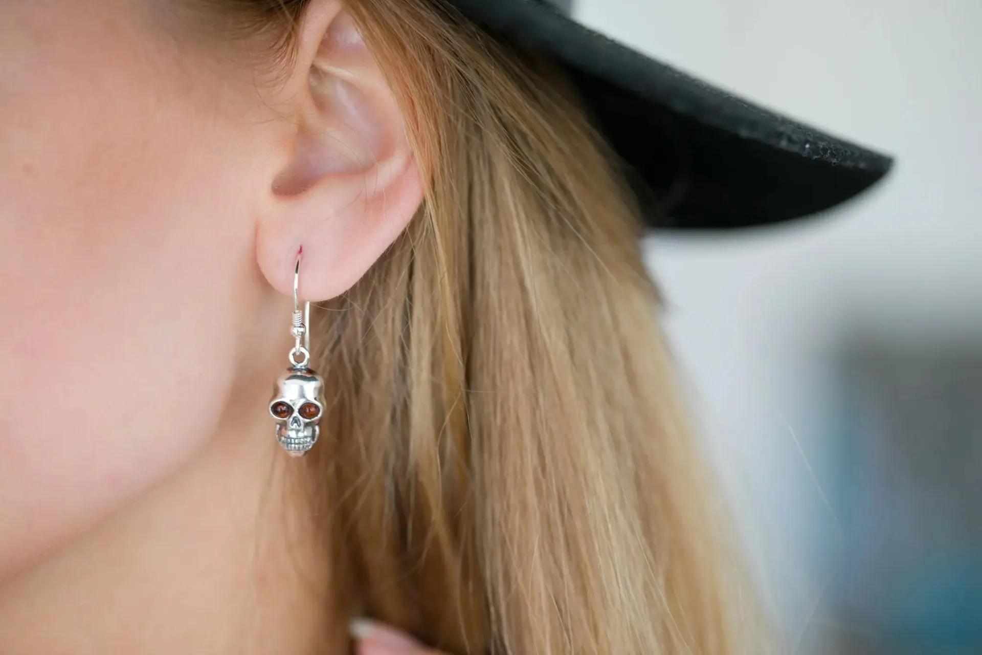 Silver Skull Dangle Earrings - Gothic Halloween Accessory with Baltic Amber Eyes